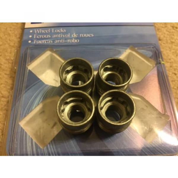 USED GM P/N 12498075 - Chevrolet, Caddilac, GMC Wheel Lock Lug Nuts #3 image